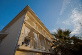 Отель Albachiara Inn Apartments  Амельа
